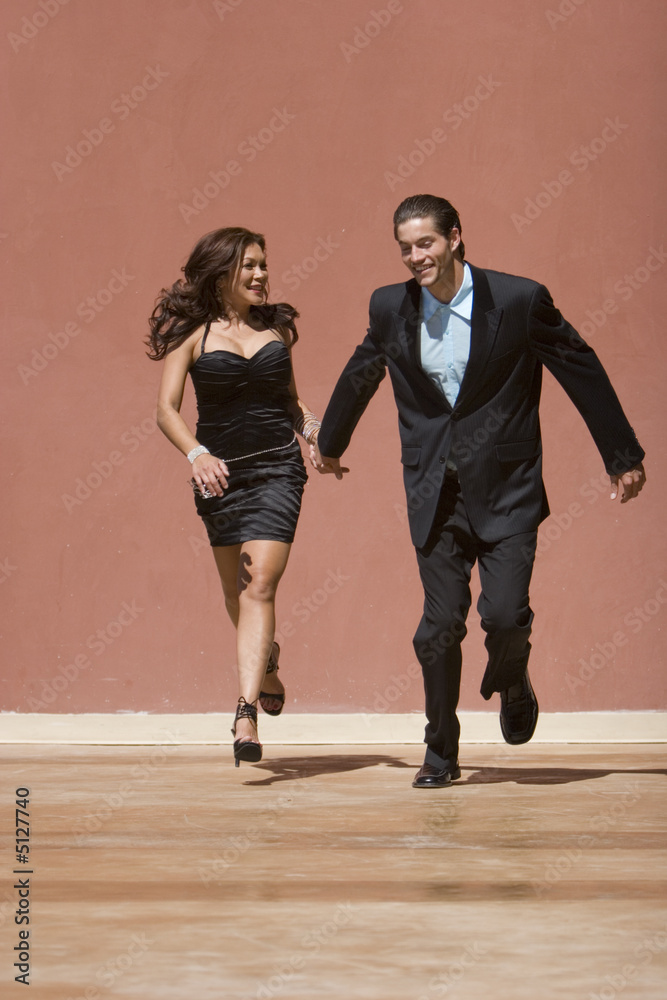 Fototapeta premium Happy couple running