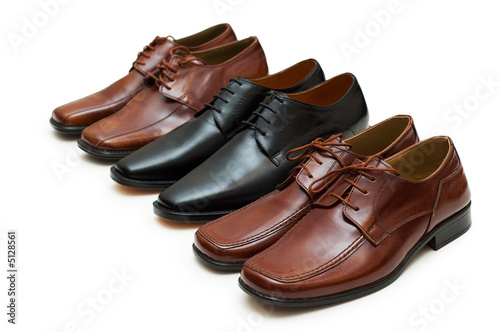 Various male shoes isolated on the white background