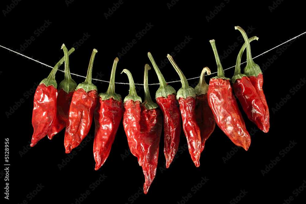 Dried red hot chili peppers isolated on black Dried red hot chili peppers isolated on black