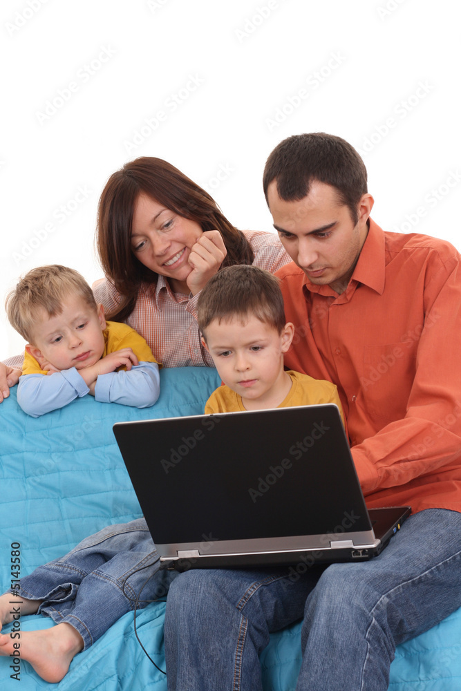 family using laptop family using laptop