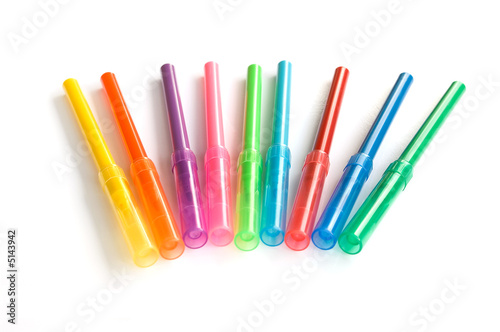 colored pencils on a white background