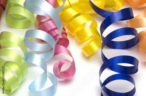 colors streamers on white background photo