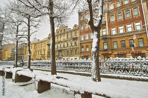 Street benche under snow photo