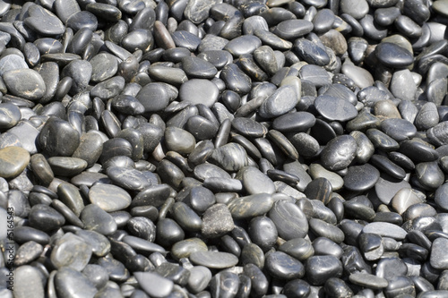 Lots of Small Black River Stone Background