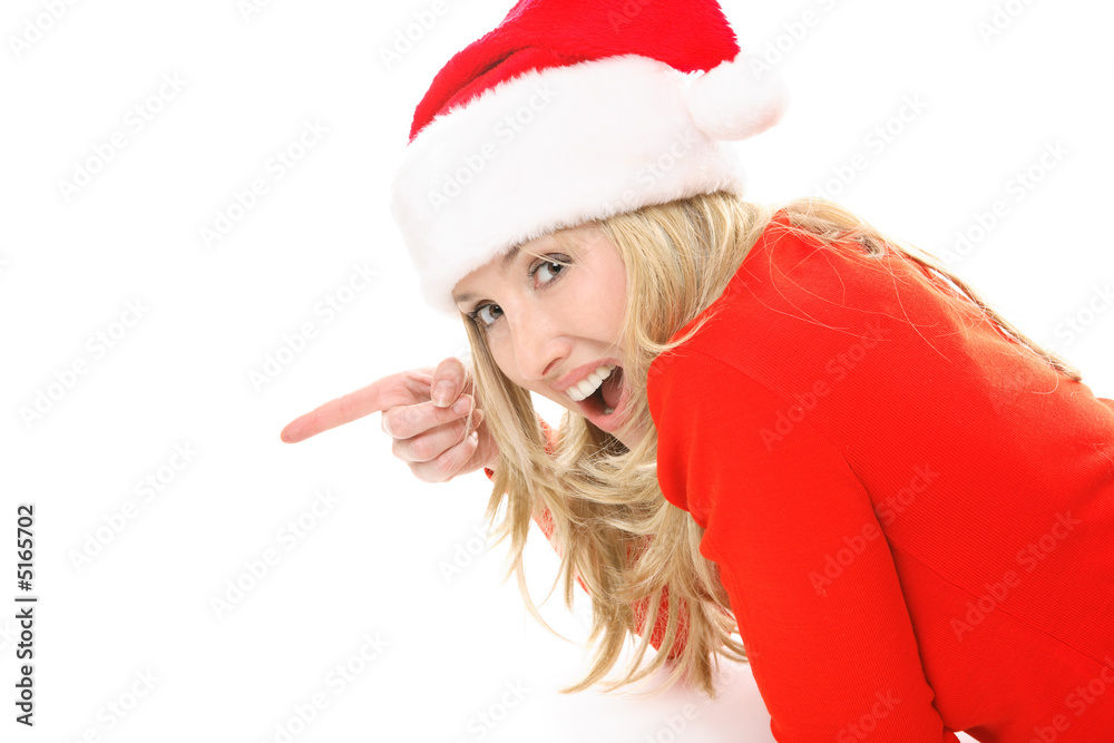 Christmas girl pointing to your message or product. Christmas girl pointing to your message or product.
