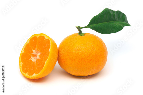 Tangerine and a half, isolated on white
