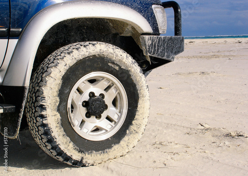 4wd tyre on beach sand