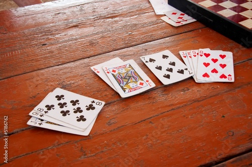 Tableau sur toile Playing cards on the wood table