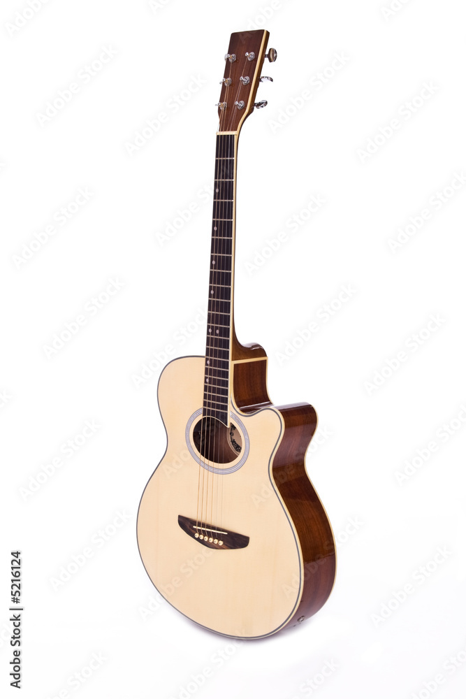 Naklejka premium Six string acoustic guitar isolated over white background