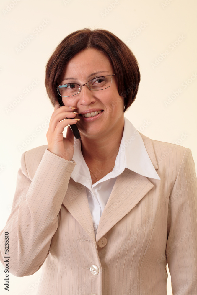White businesswoman with handy, smile White businesswoman with handy, smile