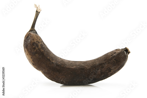 A rotten banana isolated on white