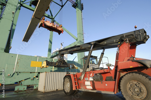 forklift truck in port action photo