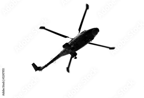 Helicopter flying on white background