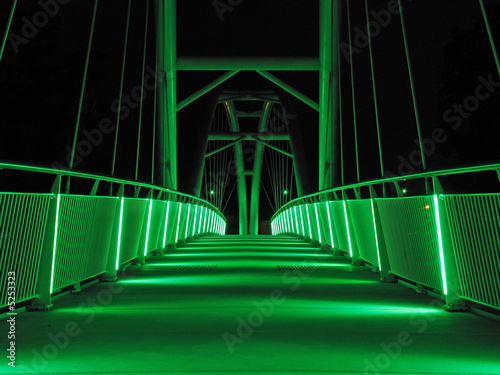 Bridge in the night with green lights