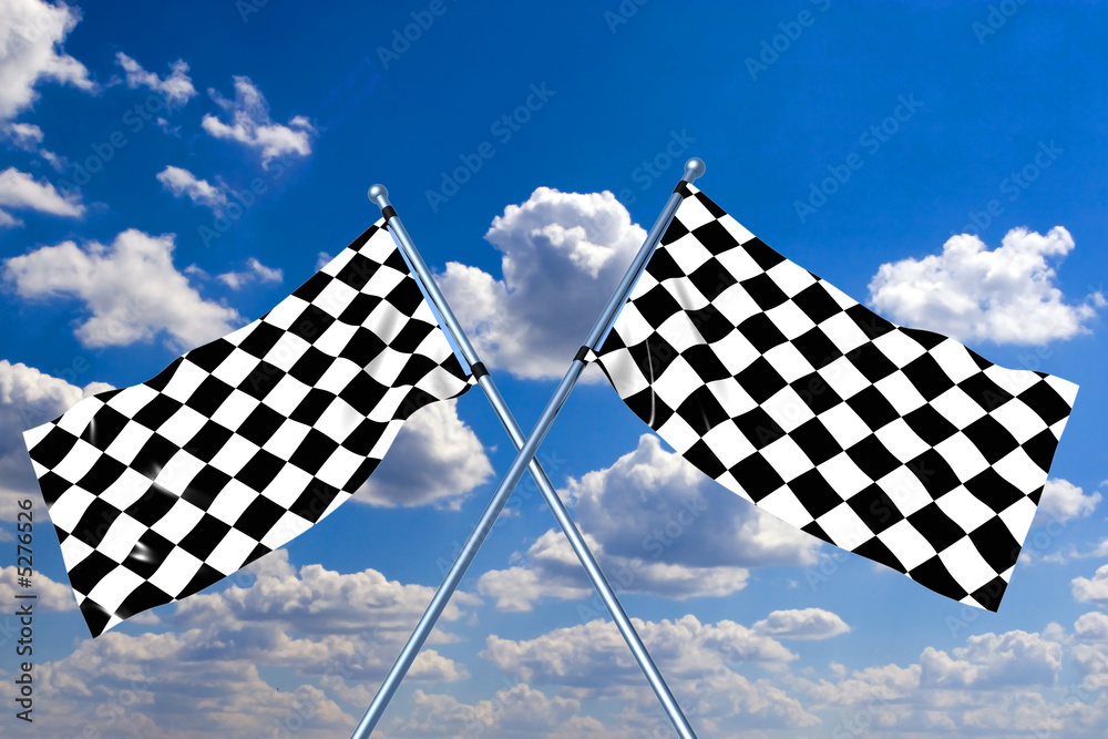 Waving a checkered flag on sky background