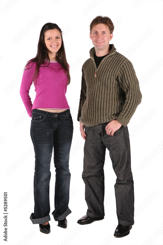 smiling couple stand