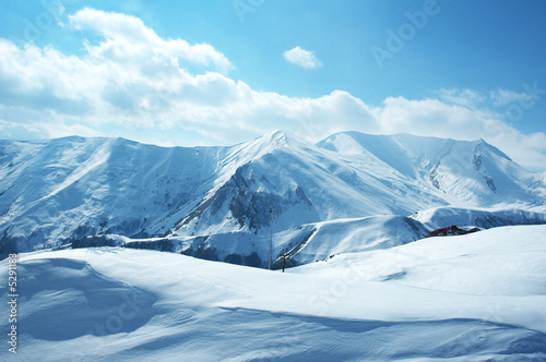 Photography Mountains under the snow on a winter day