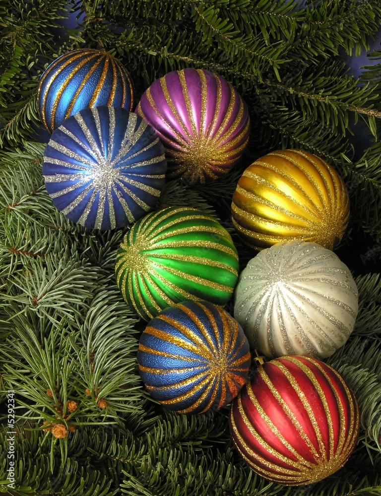 multicolor baubles on Christmas tree