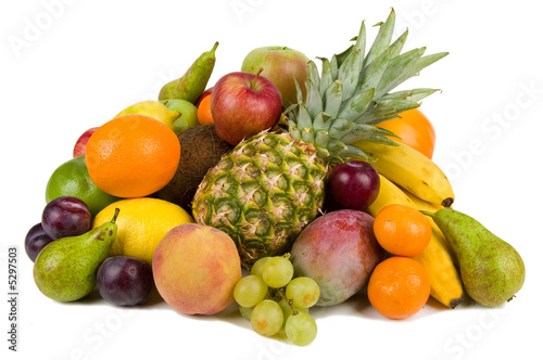 Pile of different fruits isolated on white