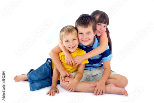 Happy kids sharing a hug