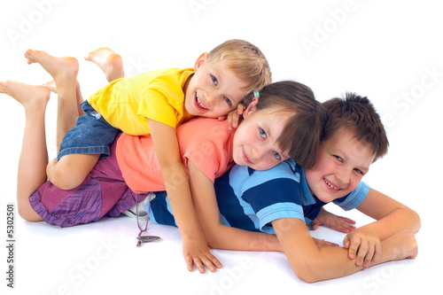 Kids lying on each other