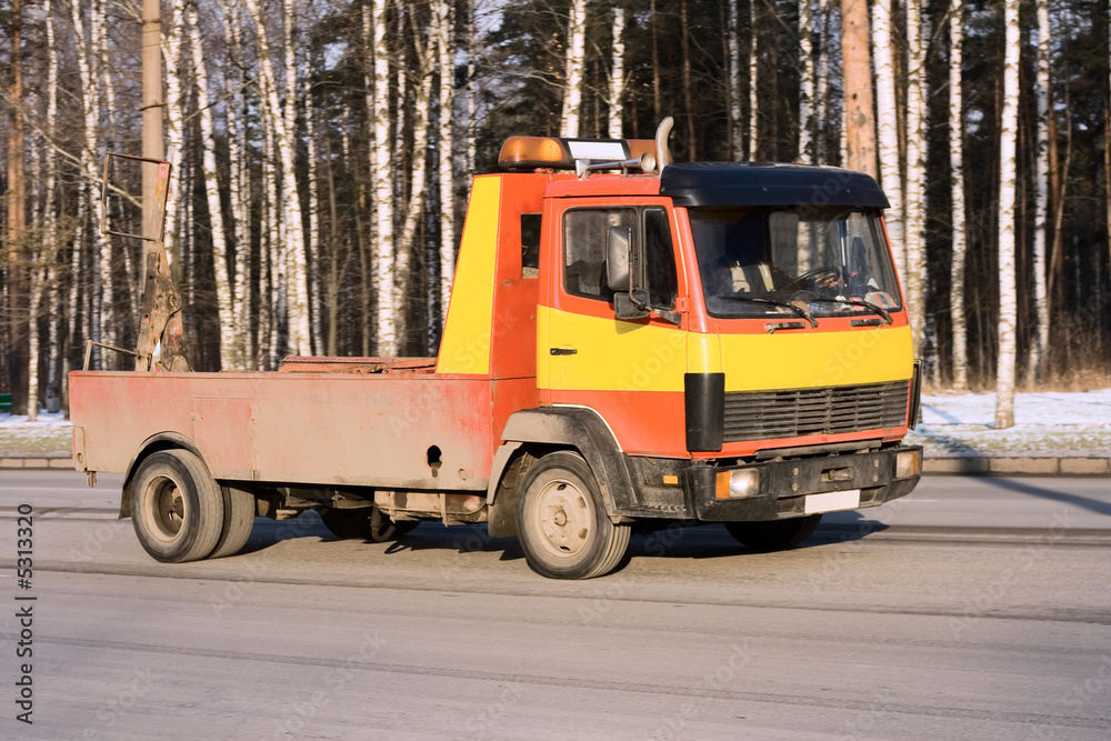 Fototapeta premium rescue wreck car carrier truck of 