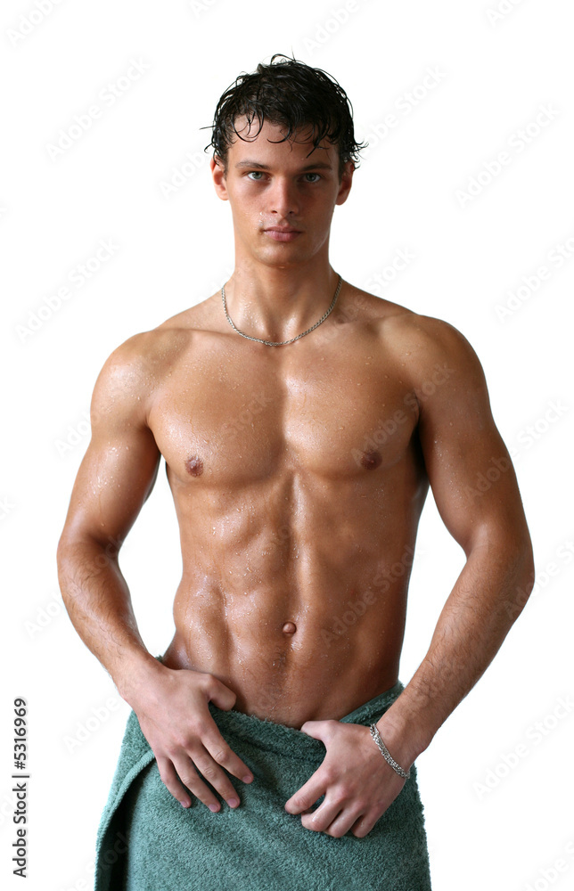 Wet Muscular Man Wrapped in a Towel Isolated on White Wet Muscular Man Wrapped in a Towel Isolated on White