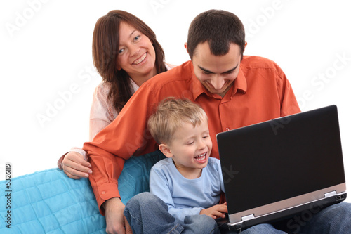 family using laptop © matka_Wariatka