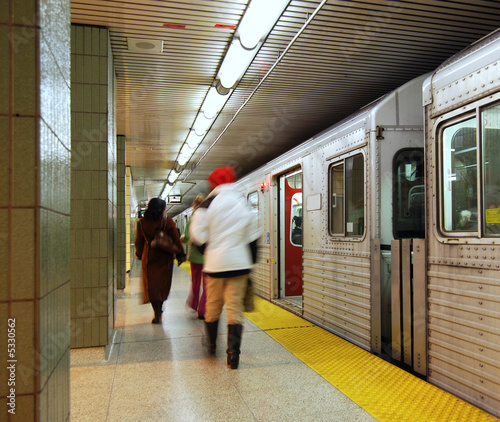 Subway train stopped in station photo