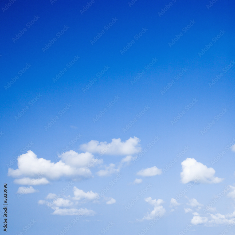 Blue sky with some white puffy clouds. Blue sky with some white puffy clouds.