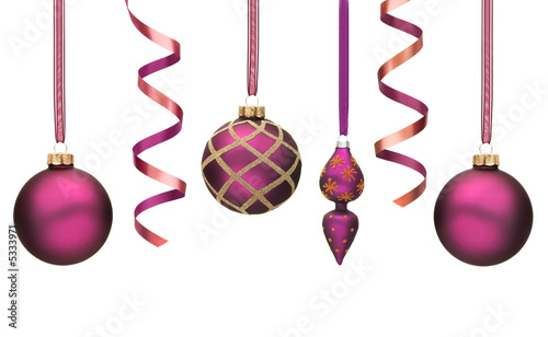 Purple christmas decorations isolated on white