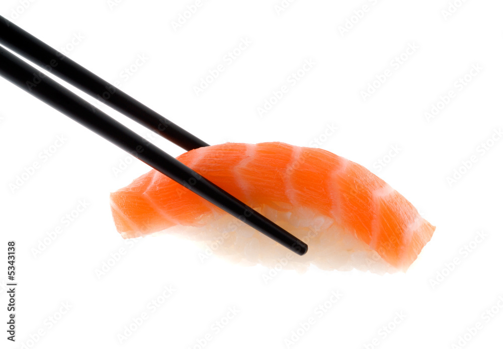 Sushi with chopsticks shot on white.