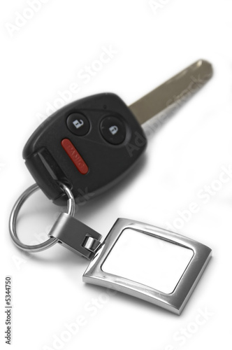 Car key with wireless remote showing a blank tag for custom text