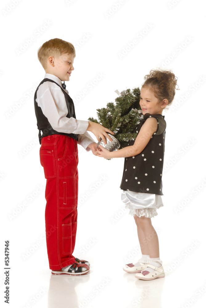 Children with a Christmas tree Children with a Christmas tree