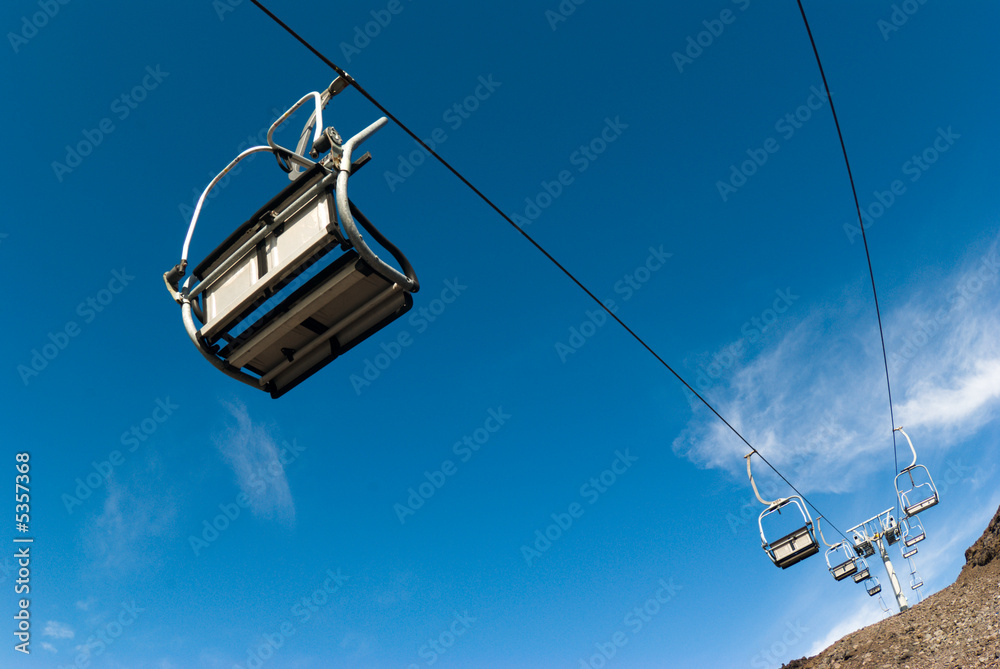 Chair skilift for skiers on the volcano Etna Chair skilift for skiers on the volcano Etna