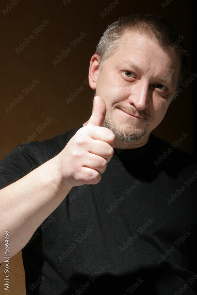 Man show thumb up sign with space for your text below Man show thumb up sign with space for your text below