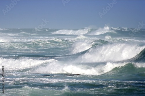 Large ocean waves breaking on a stormy day