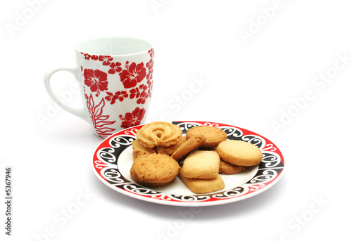 Cookies and cup isolated on a white background.