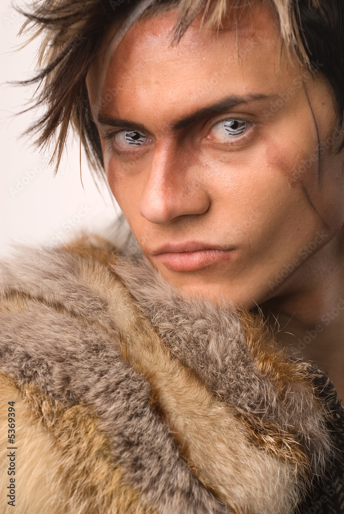 Young the man in an image of wolf Young the man in an image of wolf