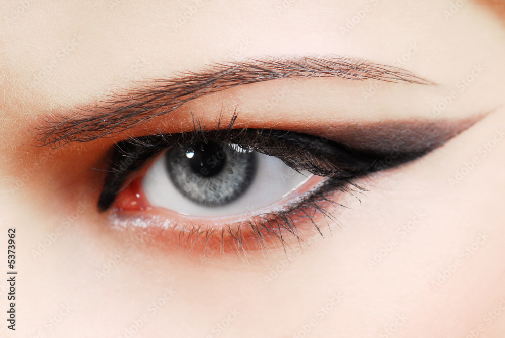 Naklejka premium Make-up style of arrow. Woman eye with fashion desing.