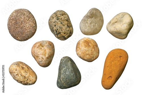 Varicolored granite, quartz and sand-rock round gravel stones.