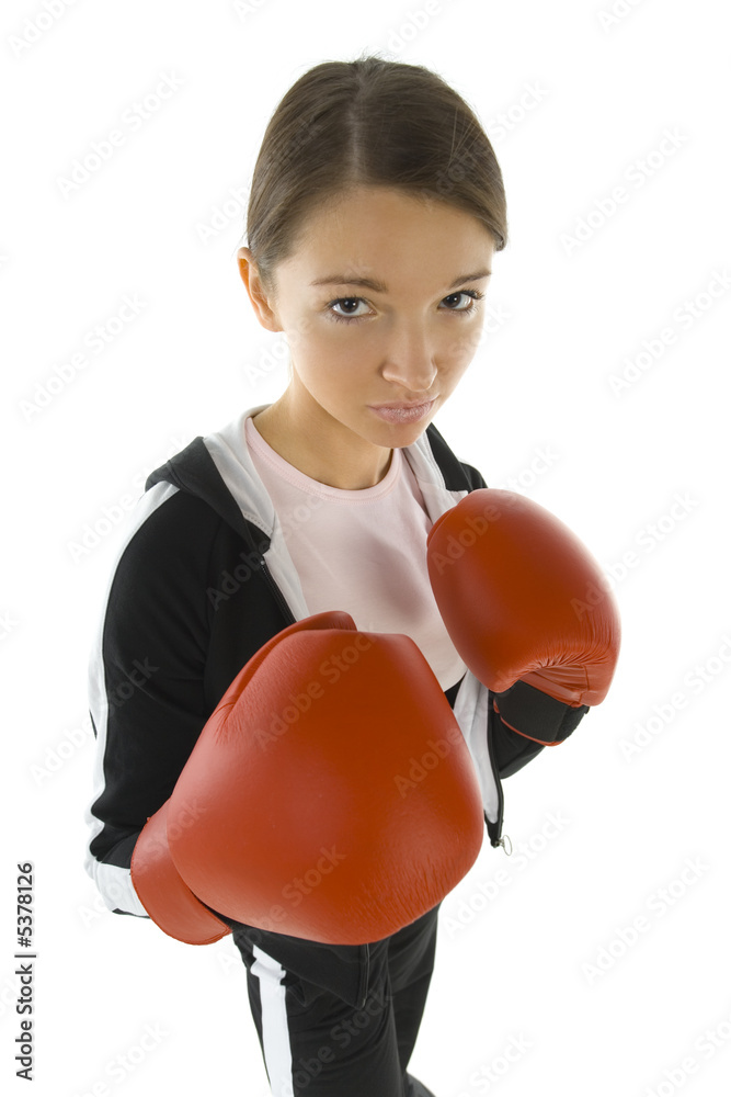 Young, scared beauty with boxing gloves. Young, scared beauty with boxing gloves.