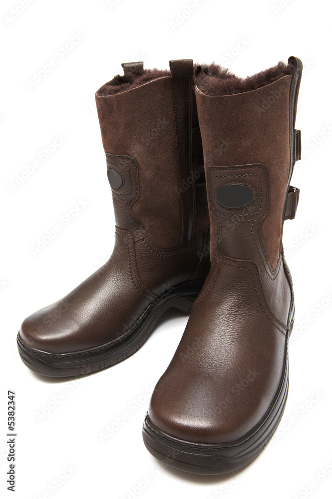 Man's boots for winter on a white background Man's boots for winter on a white background