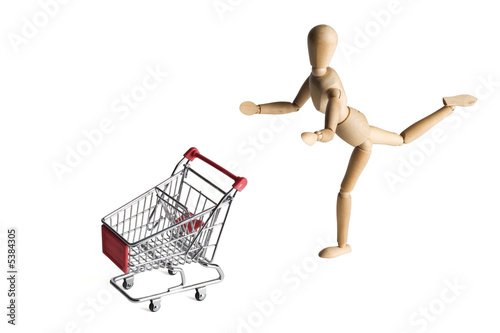 Mannequin pushing a shopping  © David Crockett