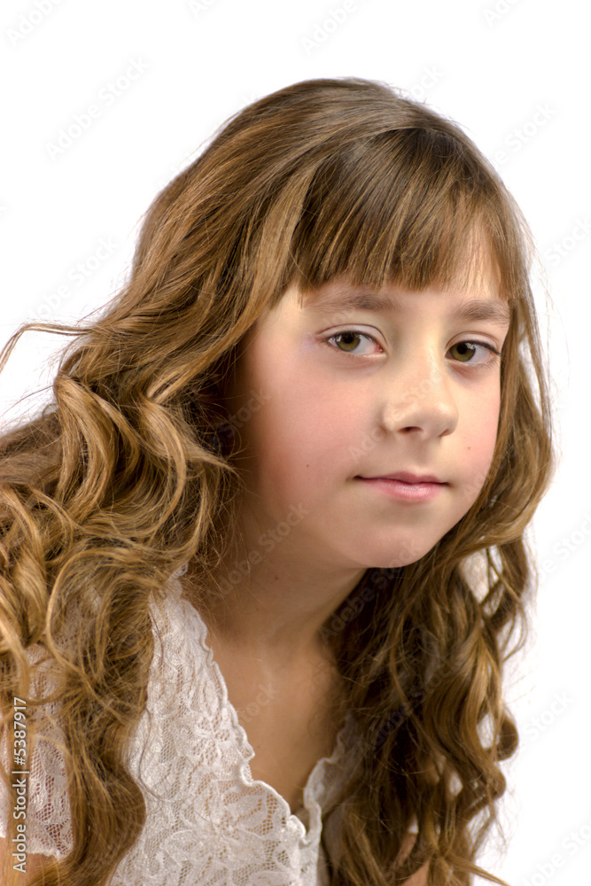 Portrait of nine years old girl with curly hair isolated Portrait of nine years old girl with curly hair isolated