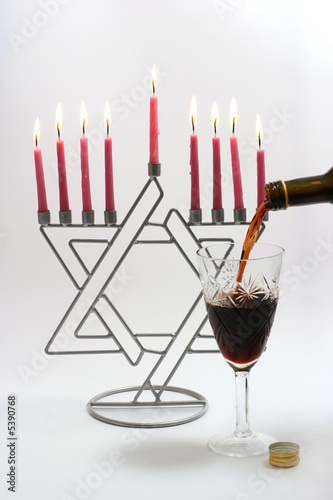 Menora with candles and wine