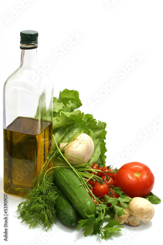 Fototapeta Naklejka Na Ścianę i Meble -  Olive oil in bottle,parsley, tomatom, mushroom,cucumber, fennel