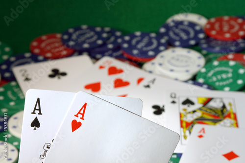 Two aces with their two ace friends in the background.