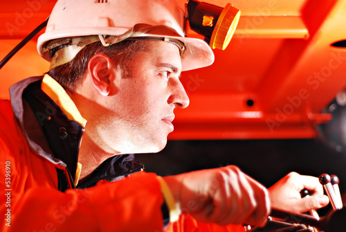 operator of a heavy duty mine drill