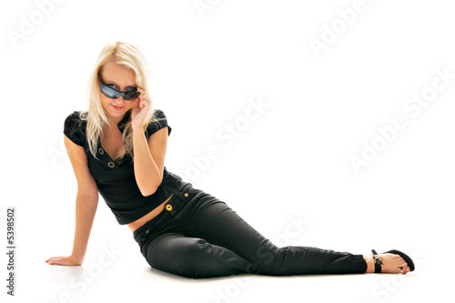 seductive woman with sunglasses isolated on white background photo